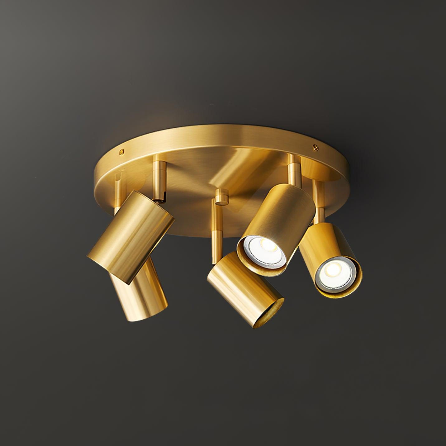 Hugo ceiling light with five GU10 spotlight heads lit warm