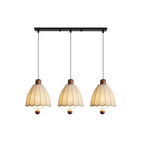 Along a linear plate, three of these Clérachic pendants hang at matched lengths on a white backdrop.