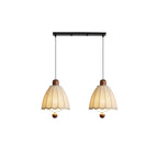 From a linear plate, two of these Clérachic pendants hang with ribbed shades shown against white.