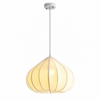 This Clérachic pendant, its tapering shade ribbed in white fabric, glows warm against a plain white background.