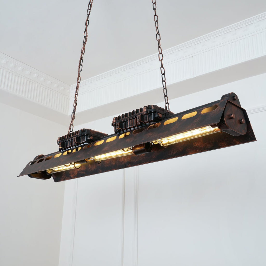 Industrial rust iron chandelier lighting a kitchen island