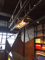 Steampunk rust iron chandelier with exposed Edison-style bulbs