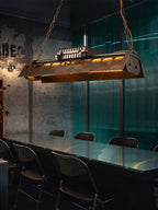 Industrial rust iron chandelier with exposed warm Edison bulbs
