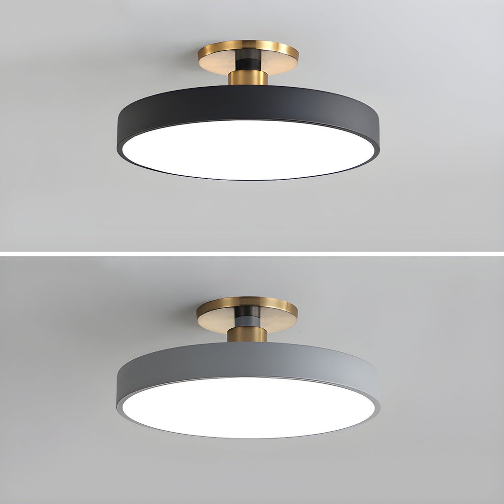 Round flush mount ceiling light with white diffuser and gold trim