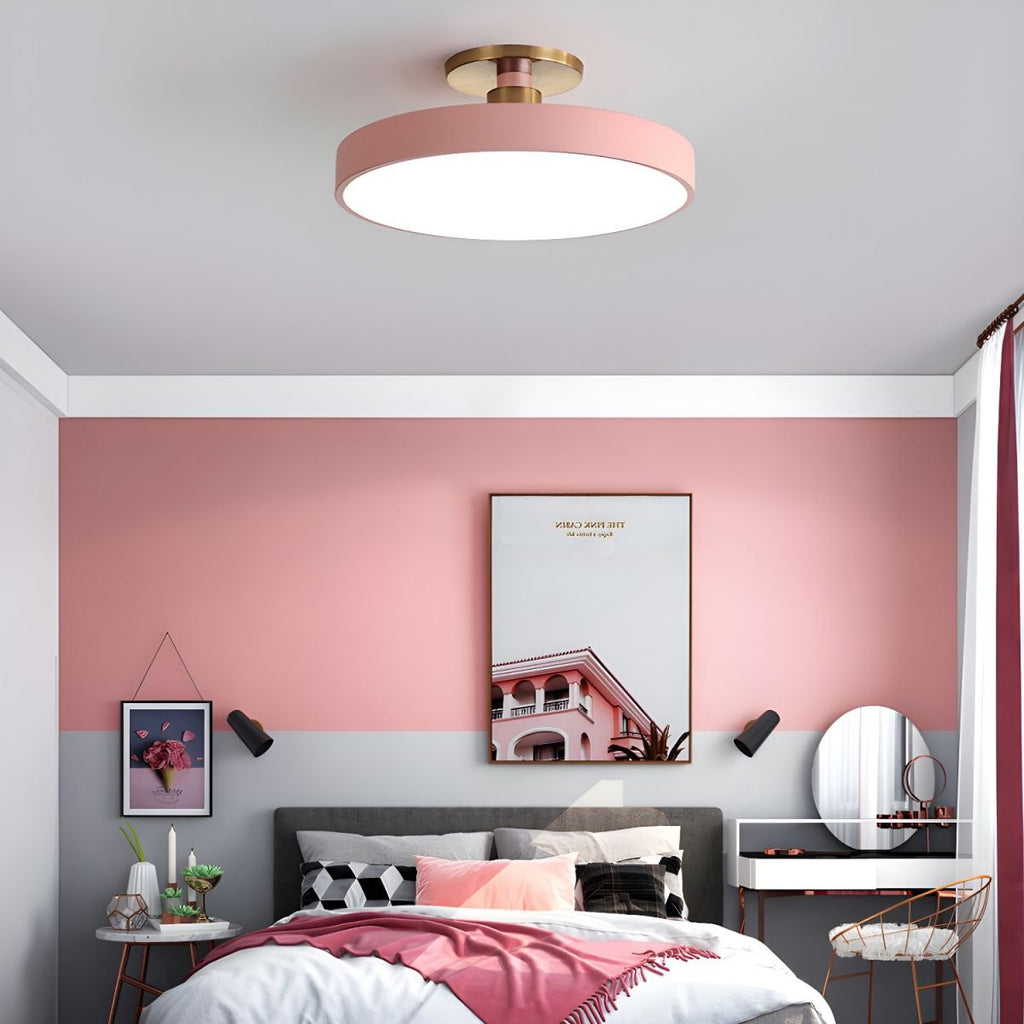 Flush mount ceiling light glowing softly in a modern office