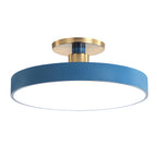 Flush mount ceiling light with soft ambient light in a bedroom