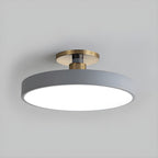 Flush mount ceiling light with white acrylic diffuser and gold trim