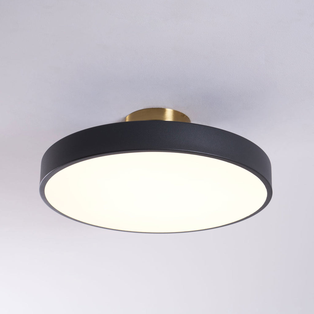Flush mount ceiling light with wide diffuser and black accents