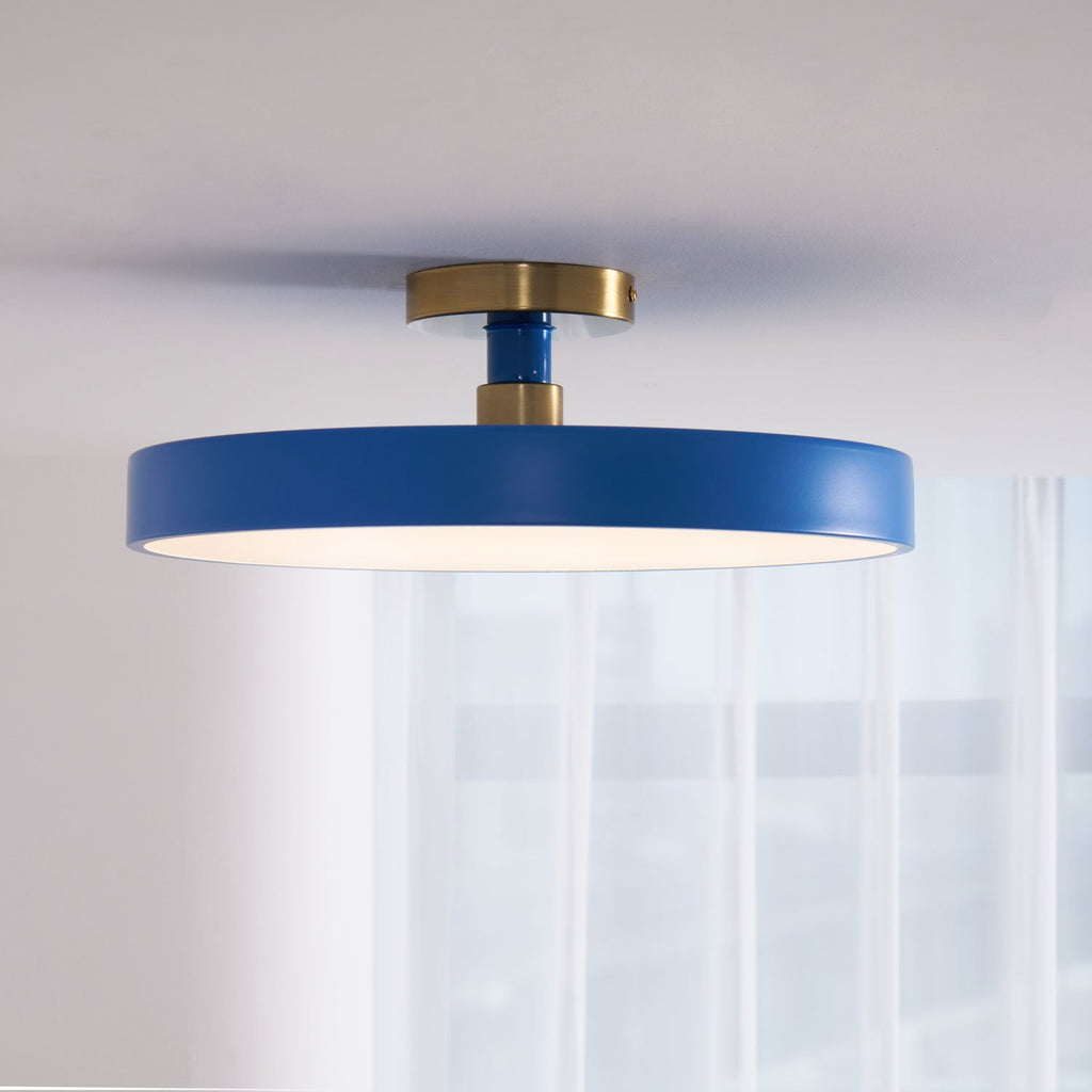 Flush mount ceiling light in yellow with white acrylic diffuser