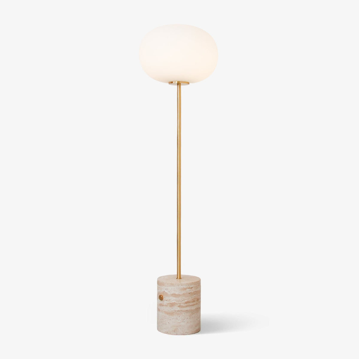 A Clérachic floor lamp with a frosted glass globe and slim brass stem on a rounded travertine base, shot on white.
