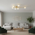 Black multi-arm ceiling light with white glass oval shades
