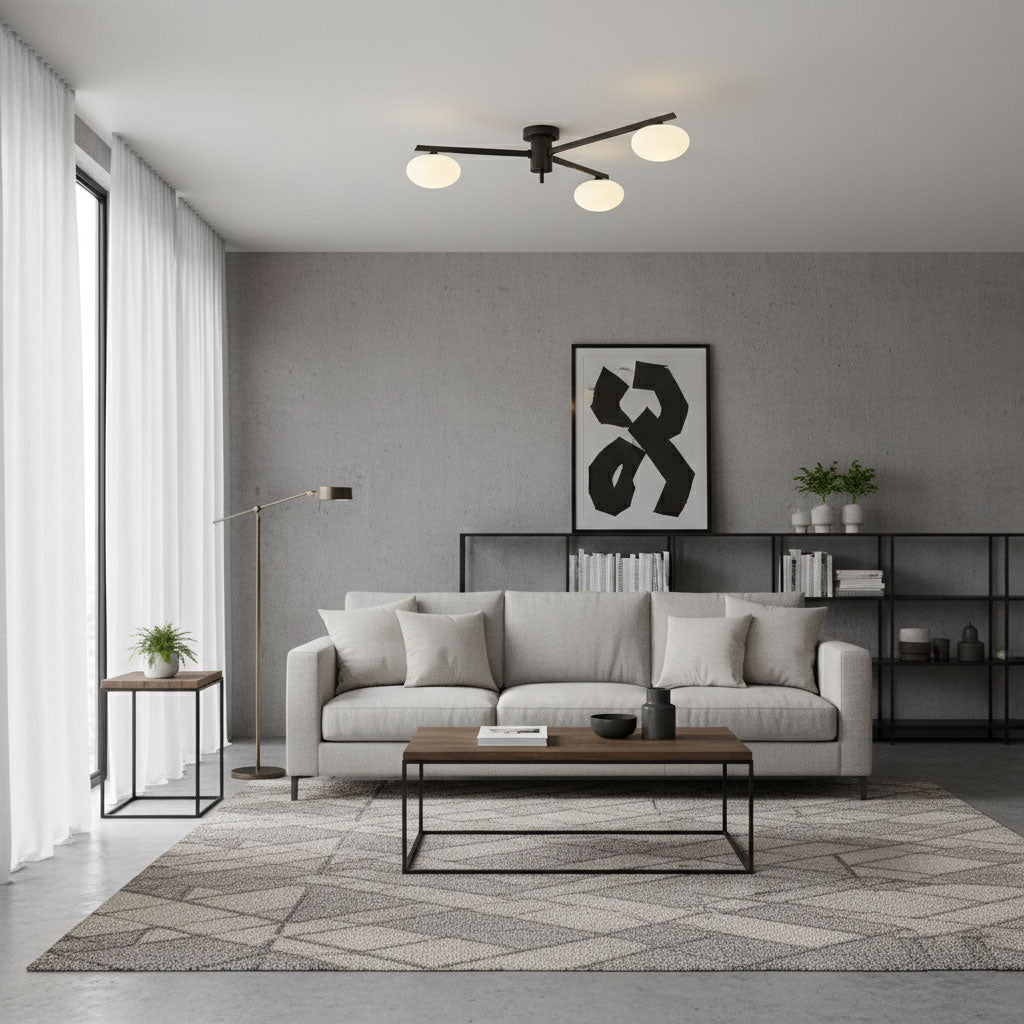 Black ceiling light with slender arms and white oval glass bulbs
