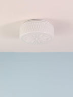 Adler ceiling light detail of the warm beige glass shade