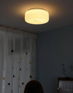 Adler ceiling light with beige shade in a warm interior