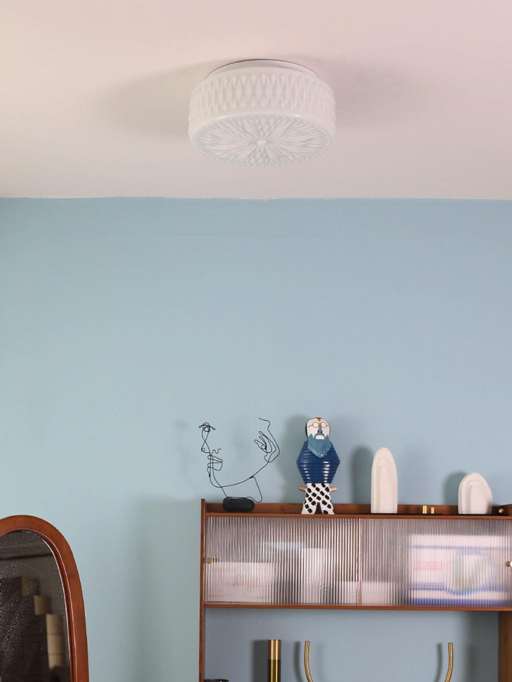 Adler ceiling light mounted in a bright modern room