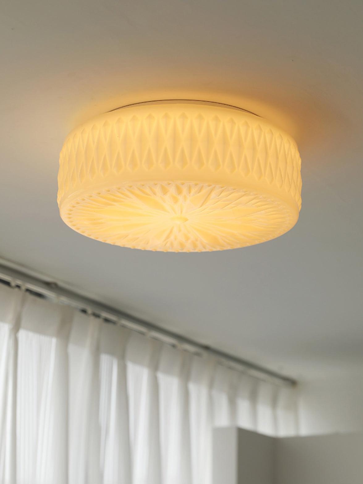 Adler ceiling light side profile showing low disc shape