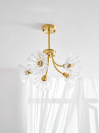 A wider view shows this Clérachic chandelier beside a sunlit sheer curtain, its glass petal shades spread outward.