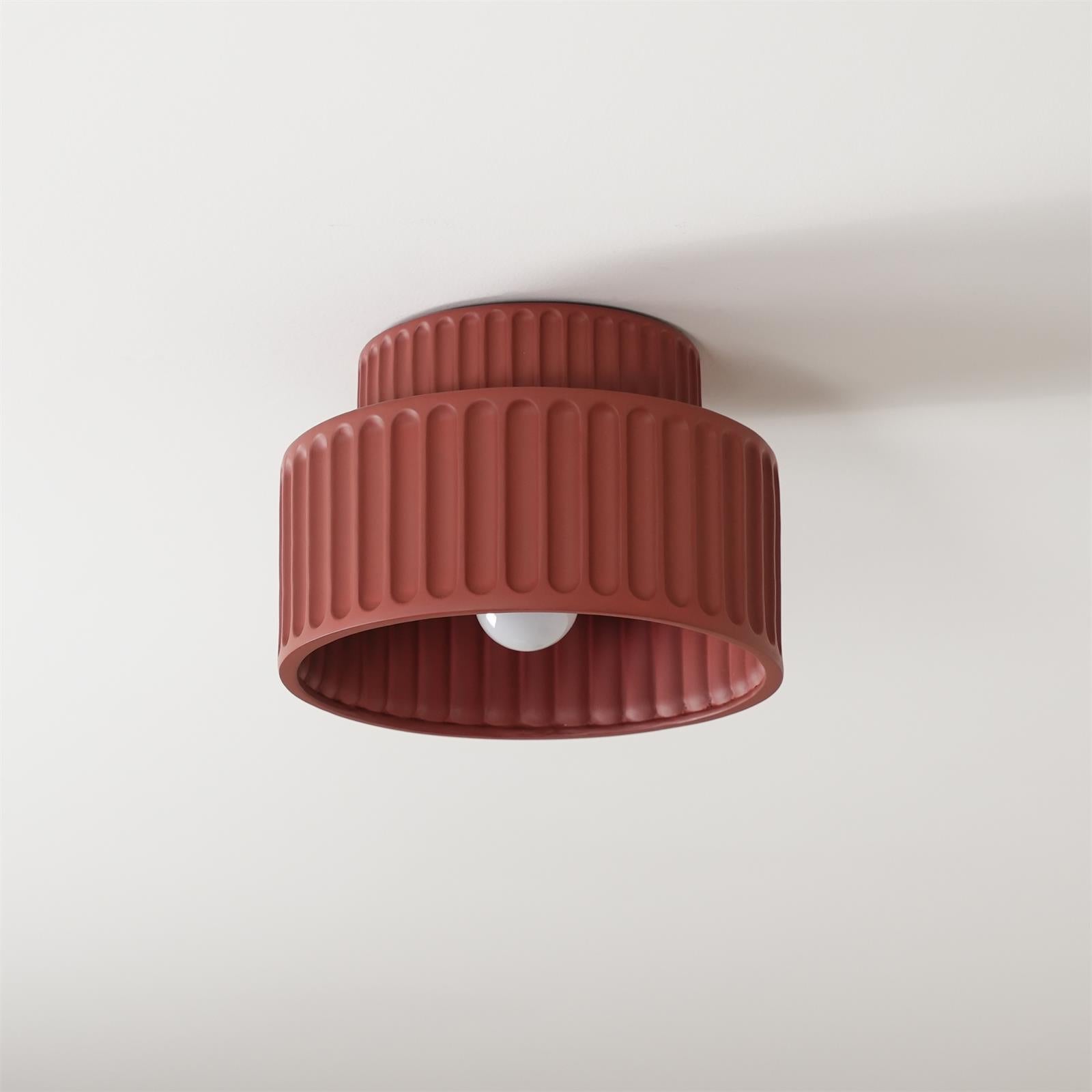 Pleated resin ceiling light in white with soft luminous shade