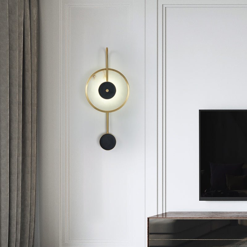 Lit on white panelling beside a grey curtain, a wall-mounted television to the right.