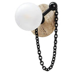 This swatch pairs the Clérachic sconce's tan travertine-toned disc with a black chain and ball finial.