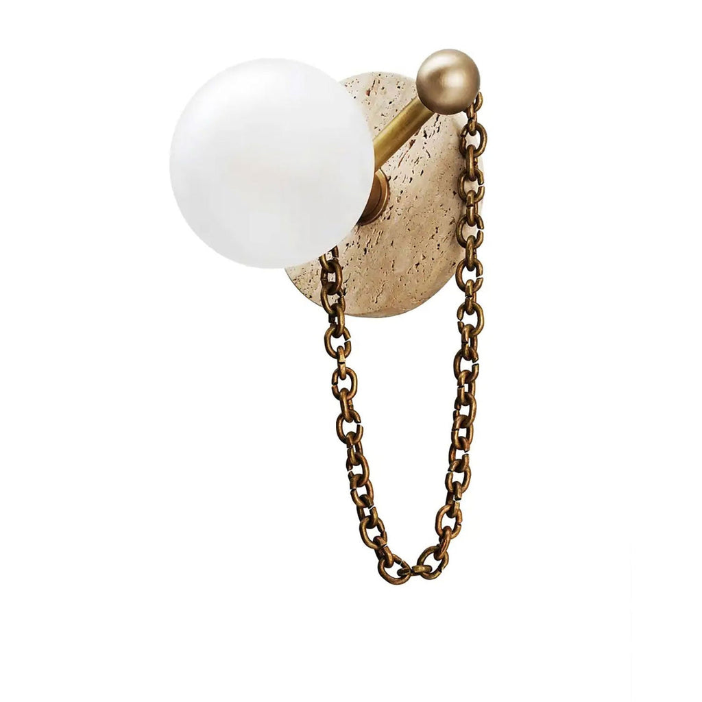 A second travertine-and-brass swatch of the Clérachic sconce, shown against the same plain white background.