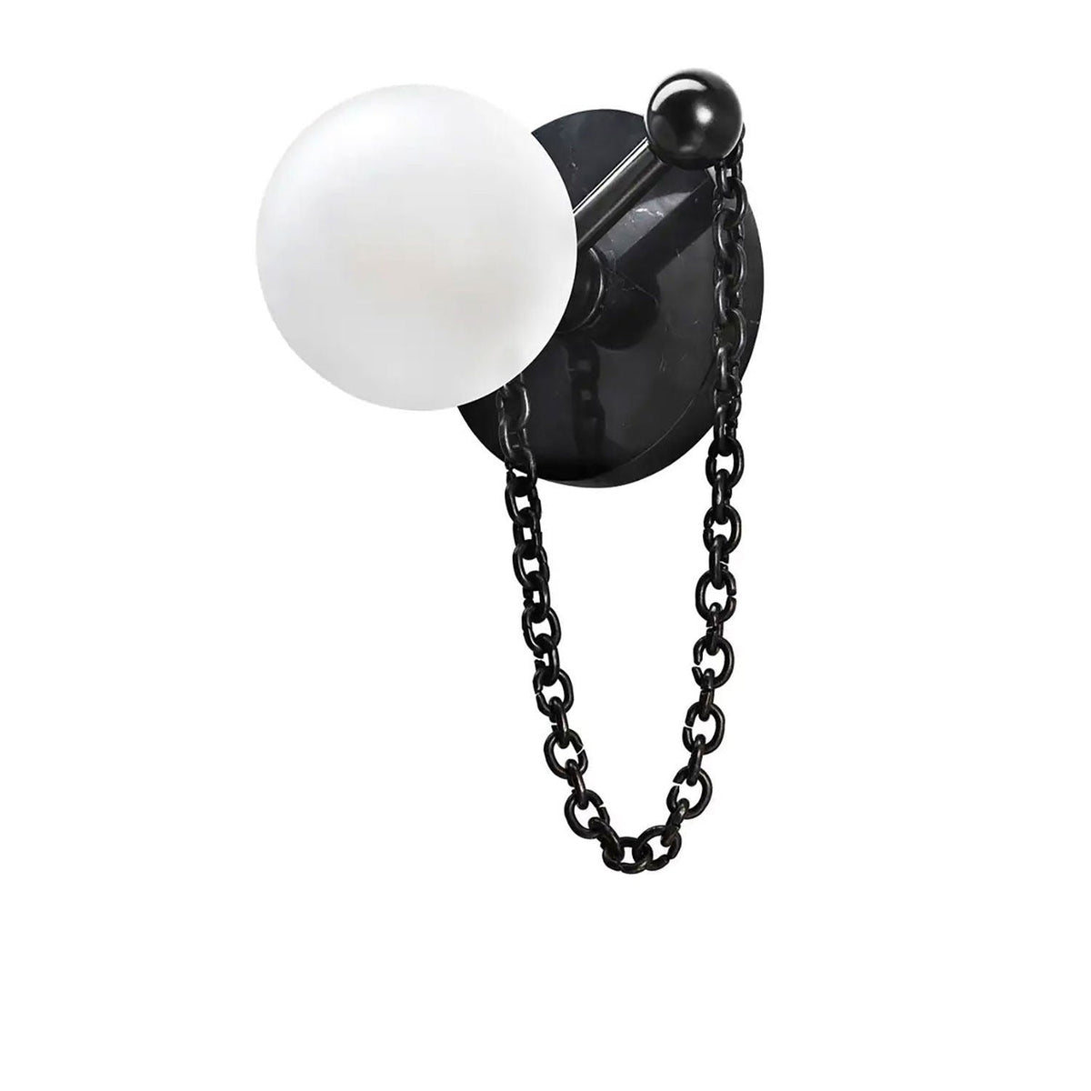 This studio swatch shows the Clérachic sconce's dark stone disc matched with a black chain and ball finial.