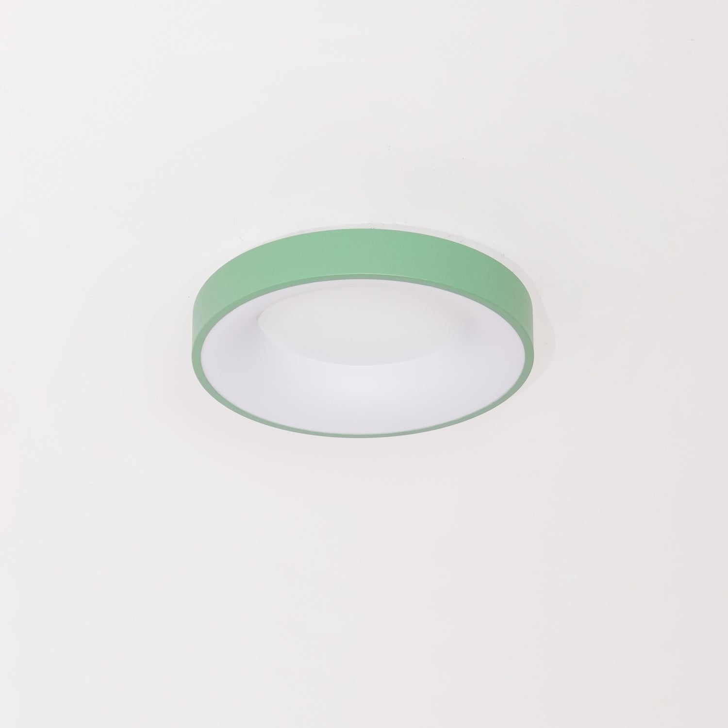 Flush mount ceiling light glowing gently in a calm room