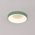 Slim white flush mount ceiling light glowing evenly overhead