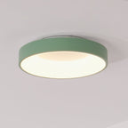 Flush mount ceiling light with white acrylic diffuser glowing