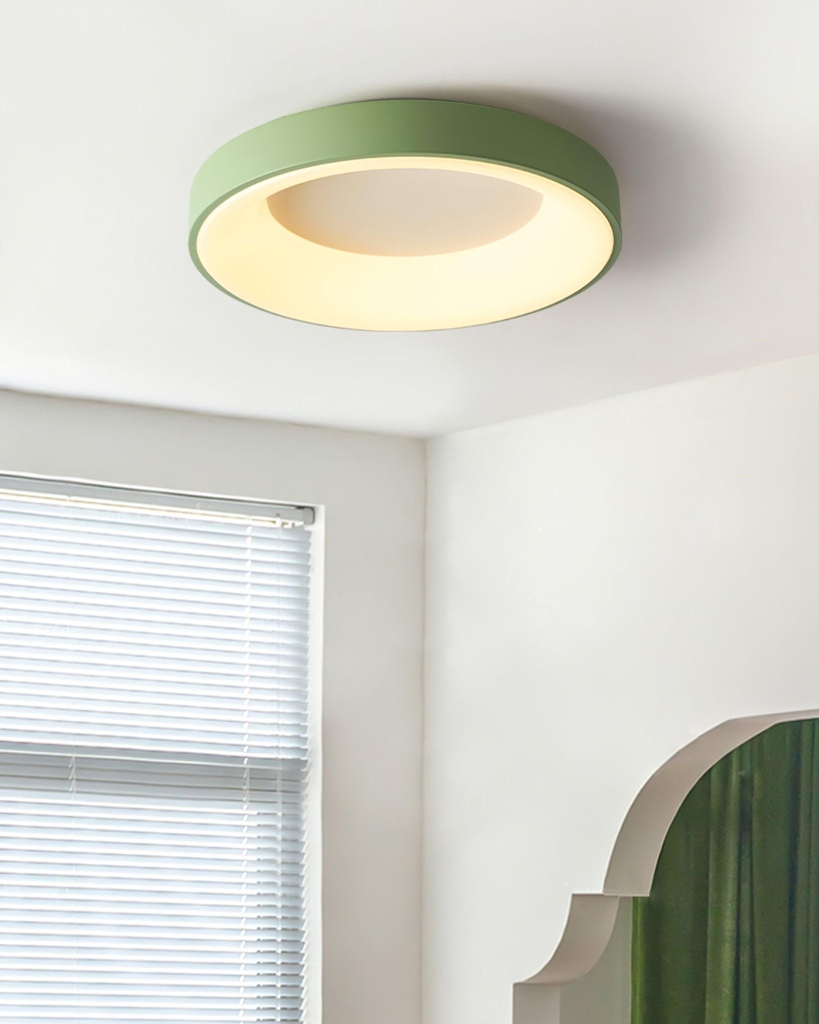 Slim ceiling light hugging the ceiling in a bright room