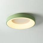 White flush mount ceiling light with even overhead glow