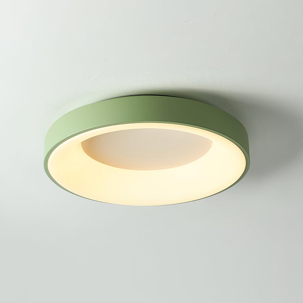 White flush mount ceiling light with even overhead glow