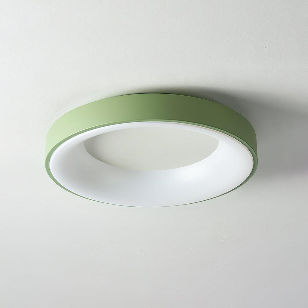 Slim green flush mount ceiling light glowing evenly overhead