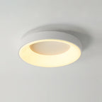Green ceiling light hugging the ceiling with a warm glow