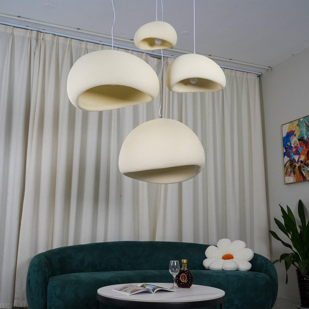 Wabi-sabi organic chandelier shown as a single hanging pendant
