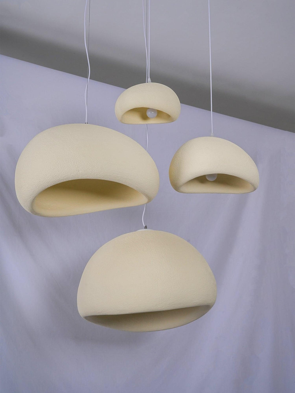 Wabi-sabi organic chandelier detail of an organic shade rim