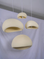Wabi-sabi organic chandelier detail of an organic shade rim