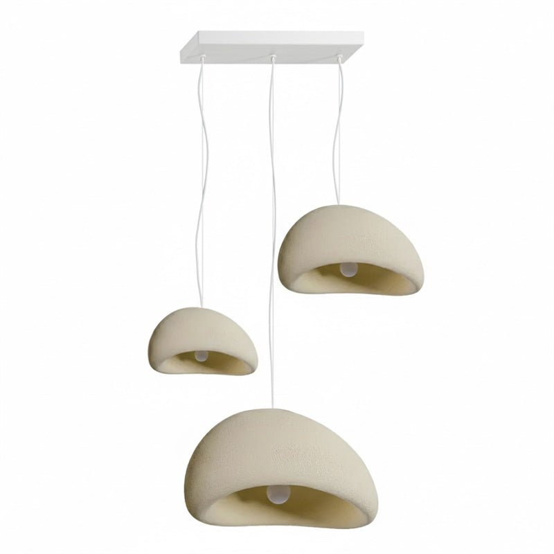 Wabi-sabi organic chandelier with warm directional light