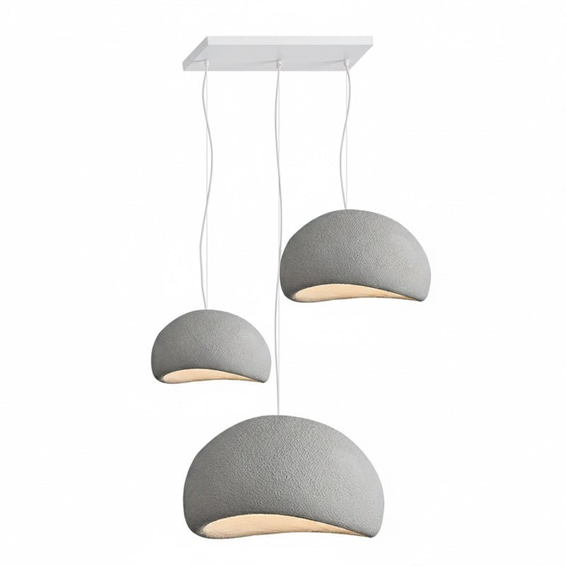 Wabi-sabi organic chandelier with neutral shades in a styled room