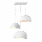 Wabi-sabi organic chandelier glowing in a meditative interior