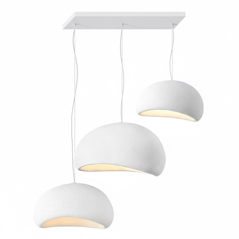 Wabi-sabi organic chandelier suspended over a lounge
