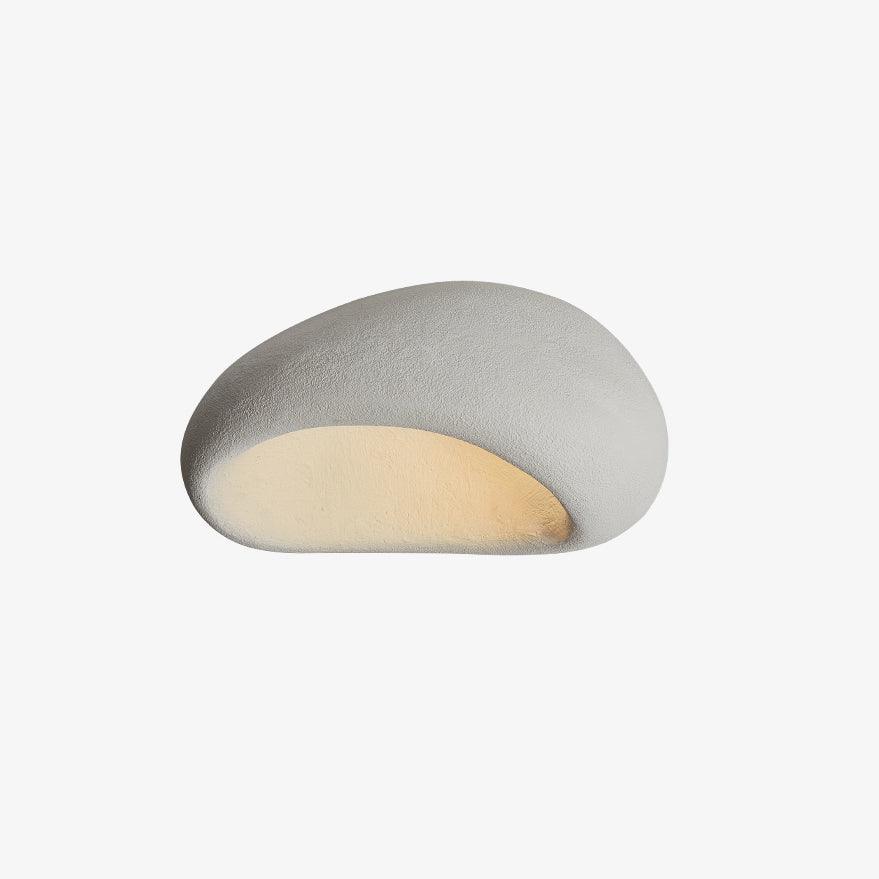 This Clérachic ceiling light glows in white texture on a plain off-white studio background.