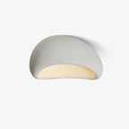 Unlit, the cement-grey cloud shape of this Clérachic ceiling light is shown on a plain white background.