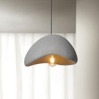 Selene Halia pendant light glowing gently above a calm interior