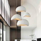Selene Halia pendant light glowing warmly above a dining table