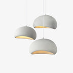 Wabi-sabi organic chandelier presented on a plain background