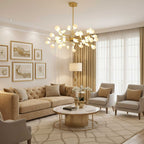 Glass leaf chandelier glowing warmly above a table