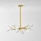 Sputnik chandelier with glowing glass leaves over a space