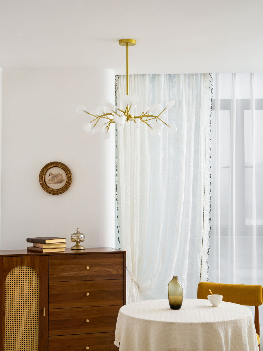 Gold sputnik chandelier with translucent glass leaf arms