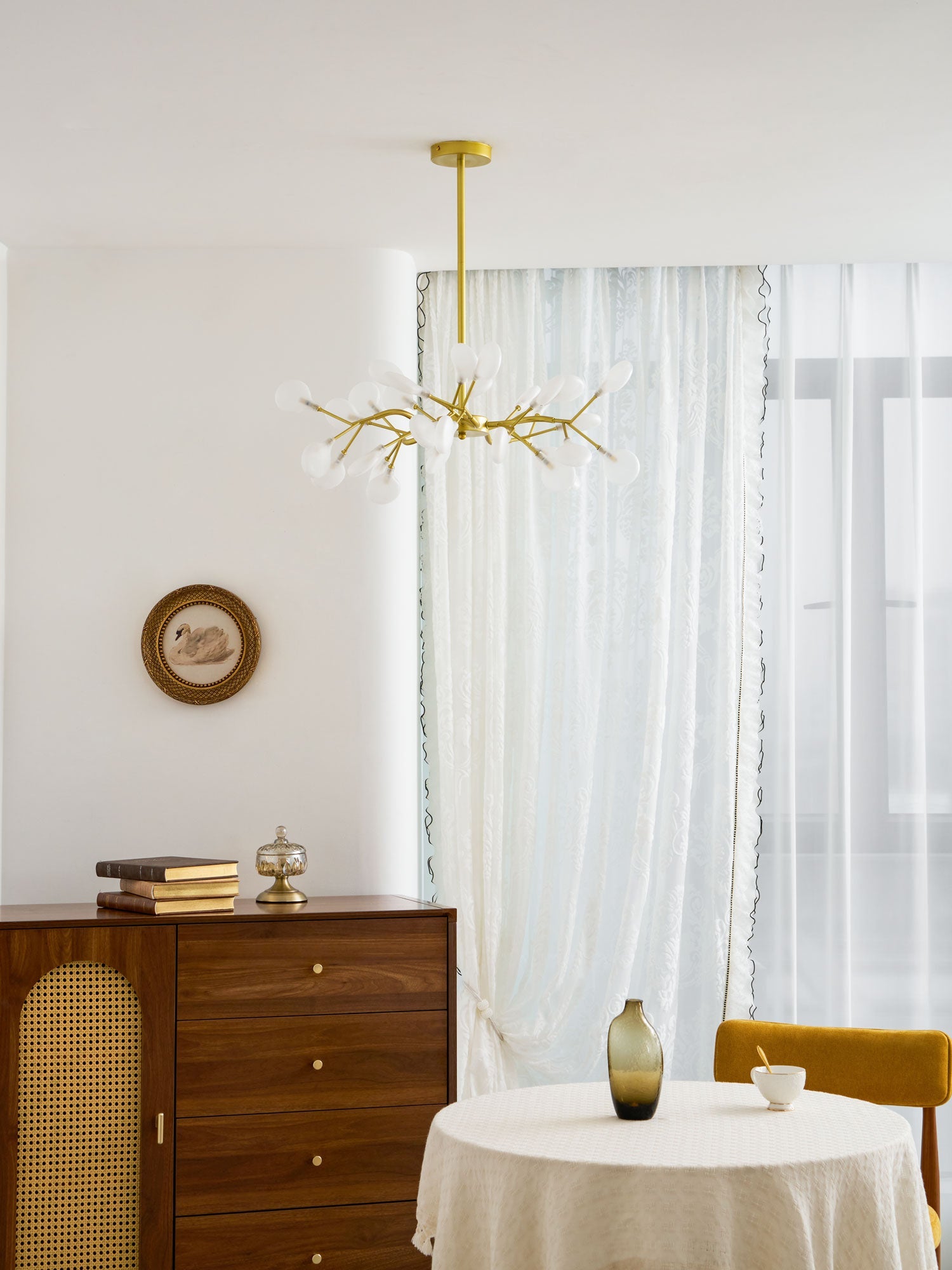 Gold sputnik chandelier with translucent glass leaf arms